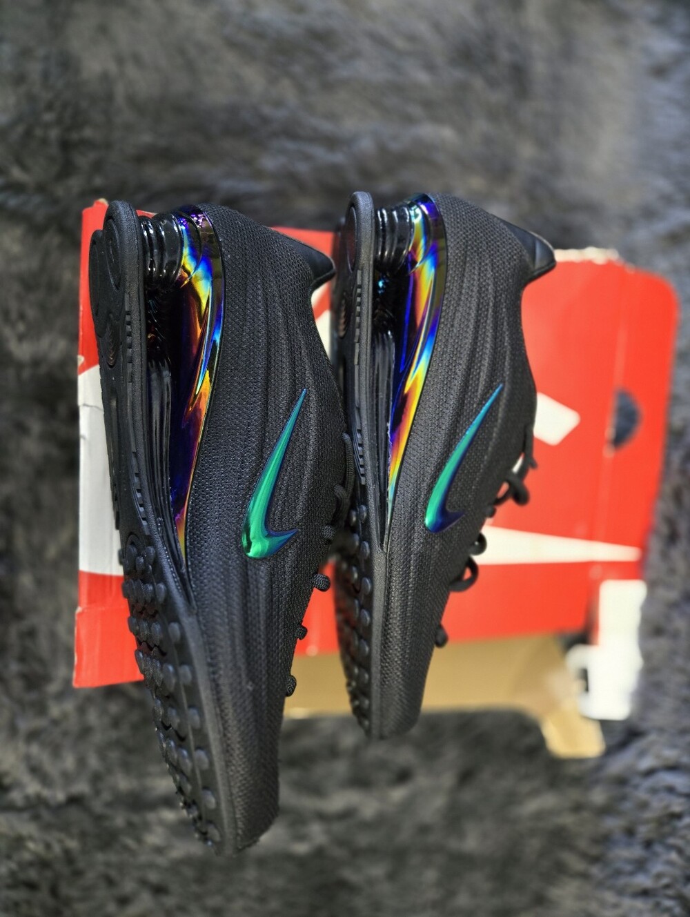 Nike Women’s Black Sneakers with Iridescent Teal Swoosh